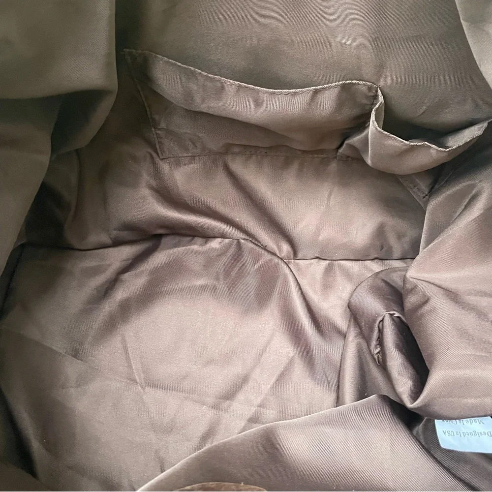 Grayish brown cotton/leather travel bag